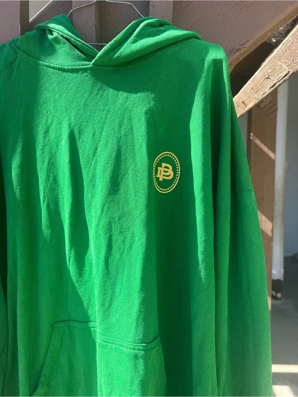Green V-Neck Sweater with Palm Graphic